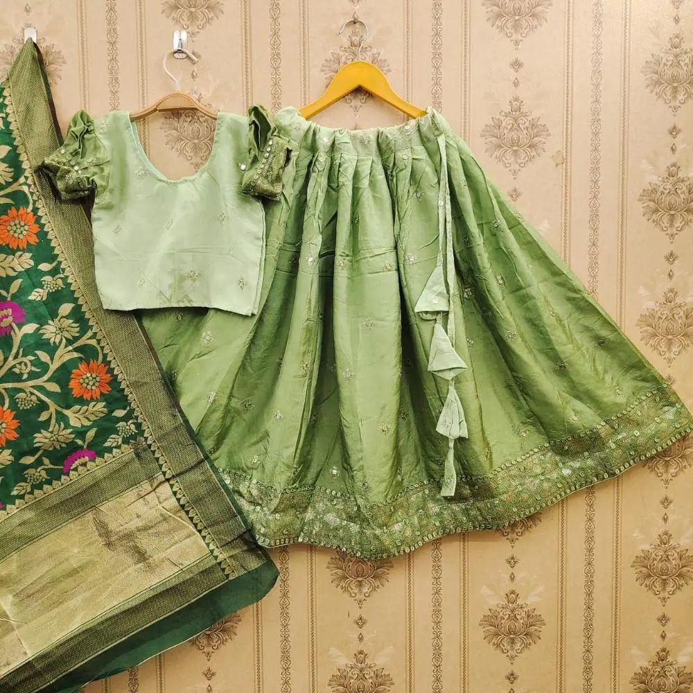 STYLISH-VISCOSE-GEORGETTE-SILK-LEHENGA-WITH-INTRICATE-CUTWORK-EMBROIDERY-IN-GREEN